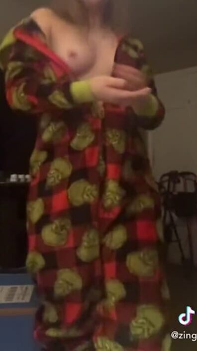 Nude girl zingshrubbery with open wide onesie on teasing with her tits NSFW vid